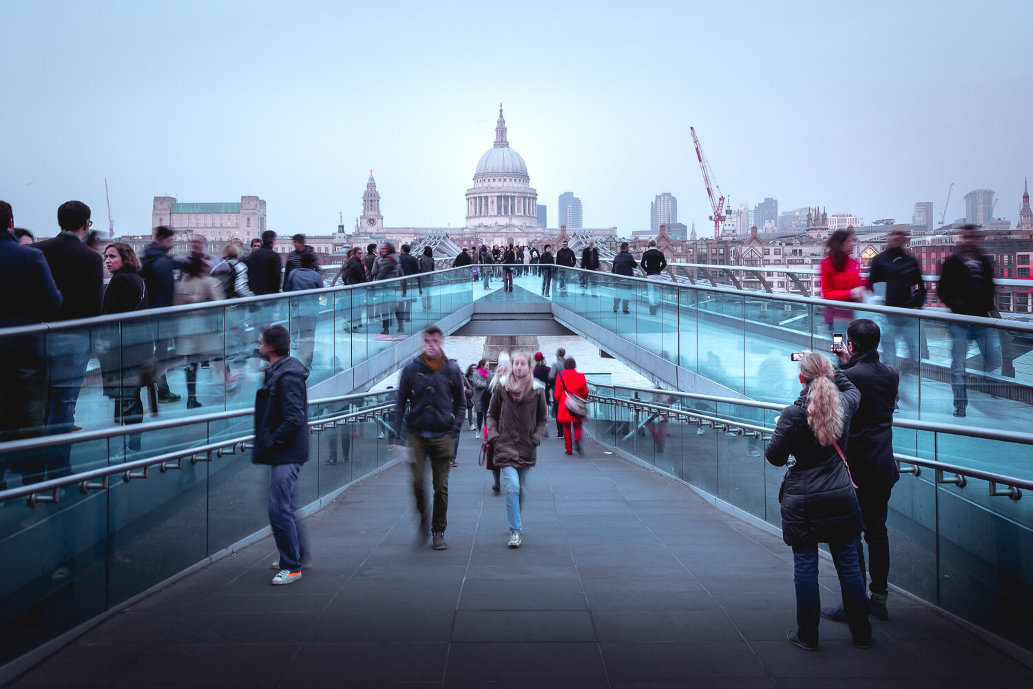 Tourist on Millennium Bridge