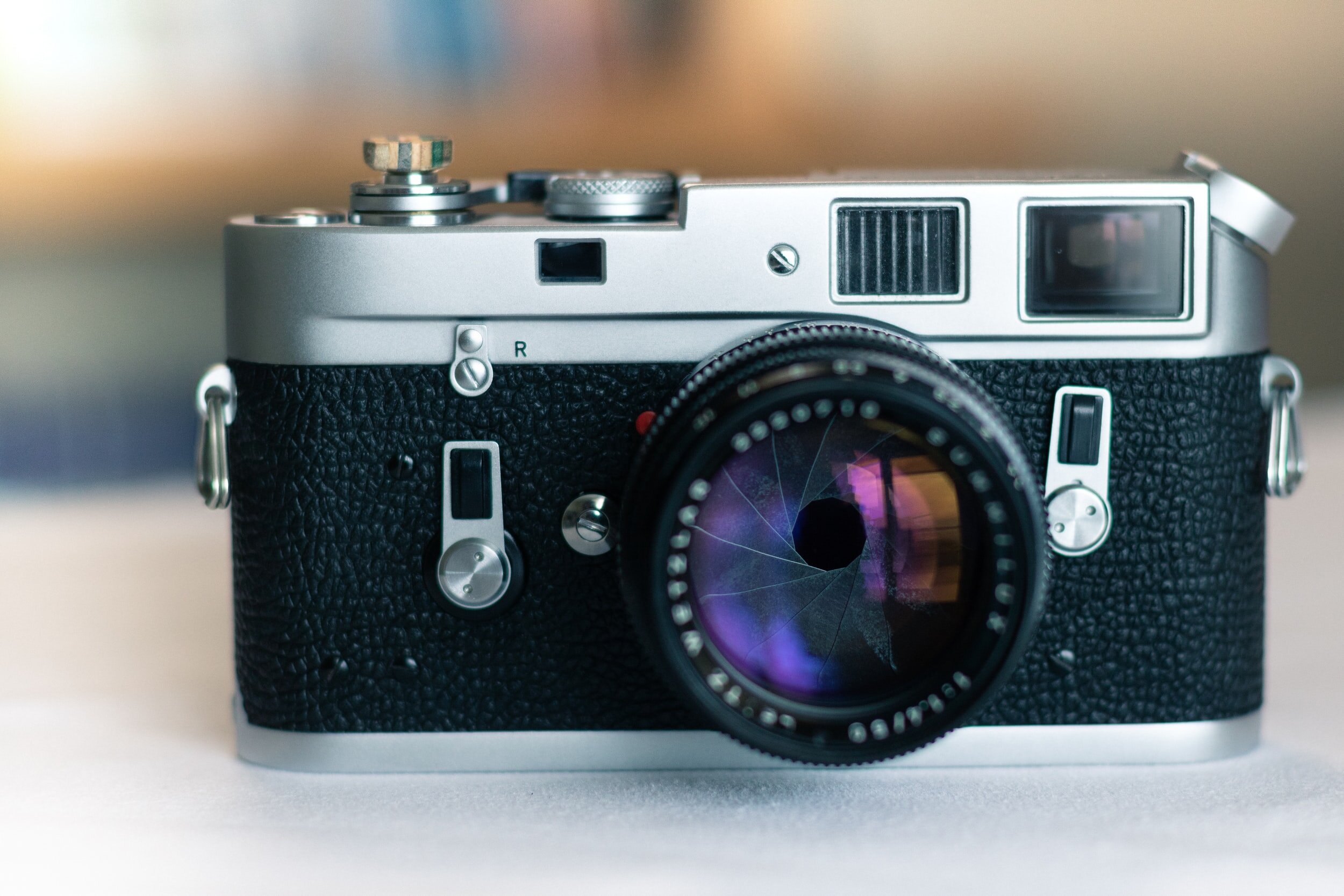 camera with the lens aperture unsplash-image-IheZ3LITH44.jpg