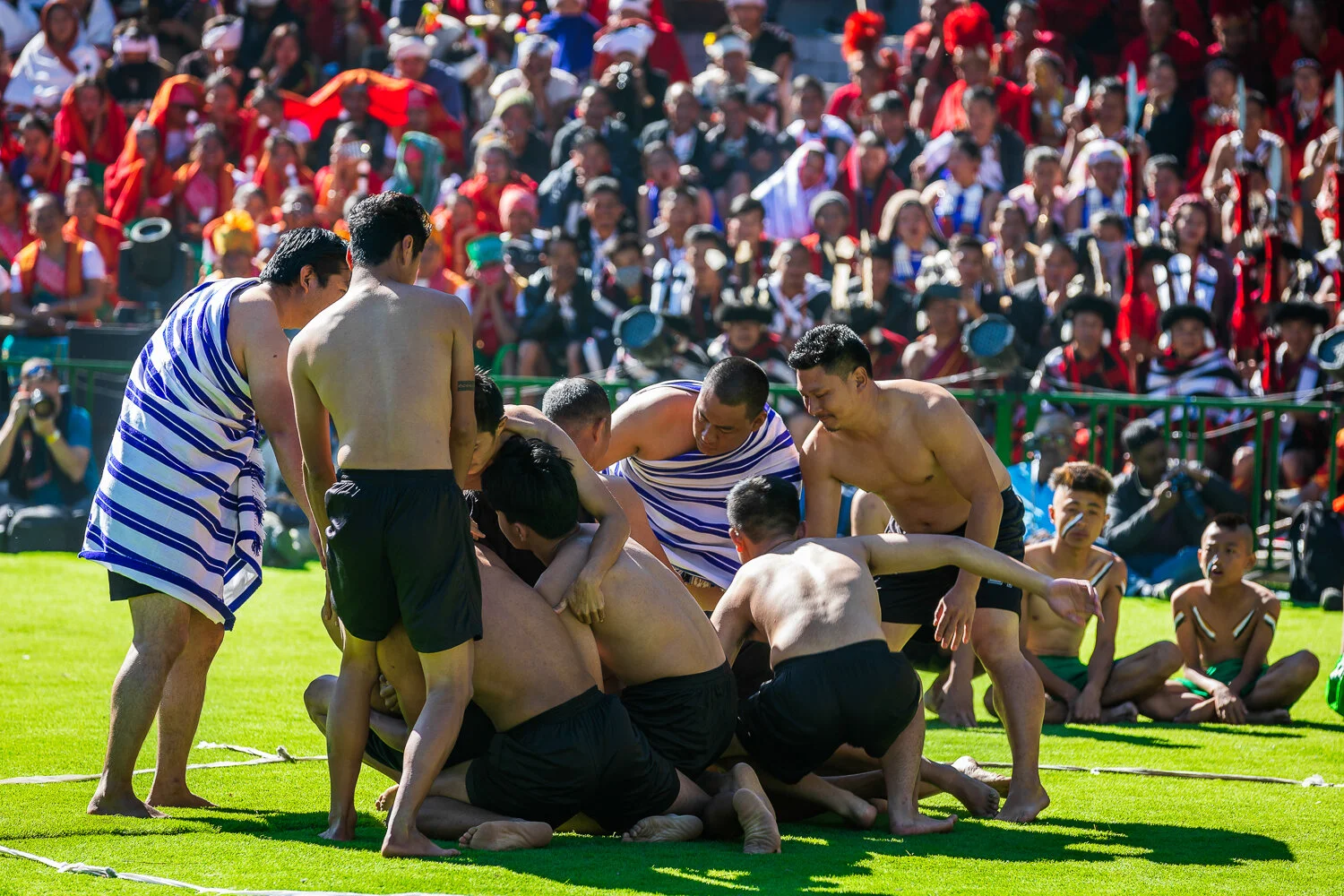 naga tribe showcasing traditional game of hekko during hornbill festival in nagaland.jpg
