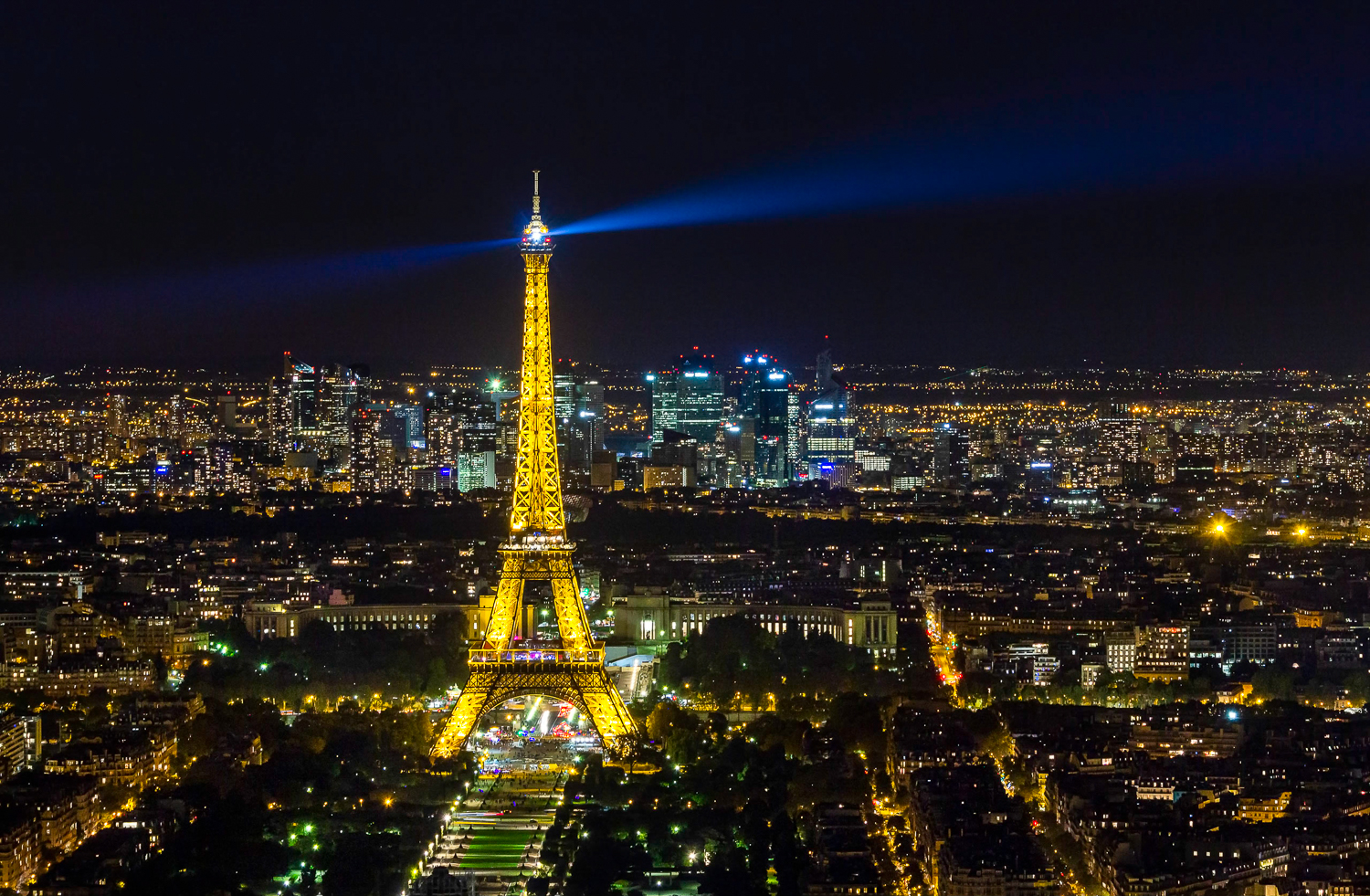 Eiffel Tower in Paris at night in city lights
